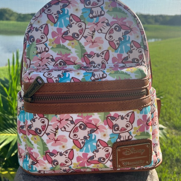 Loungefly Handbags - Loungefly Pua ❤️ Logo  mini backpack Rare